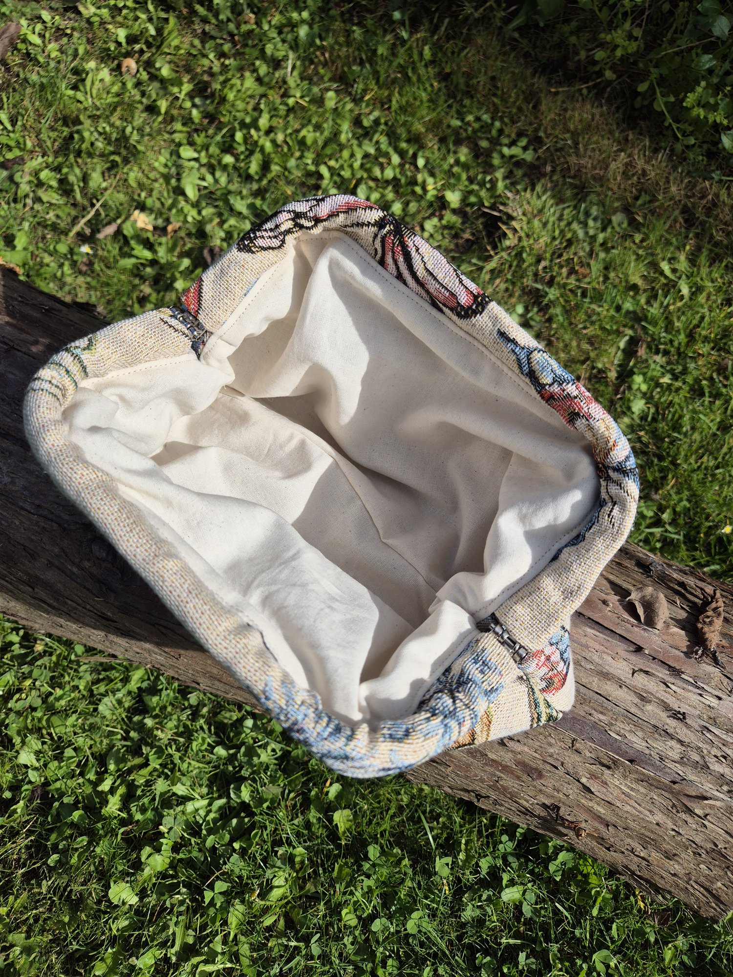 Clutch med sommerfugle